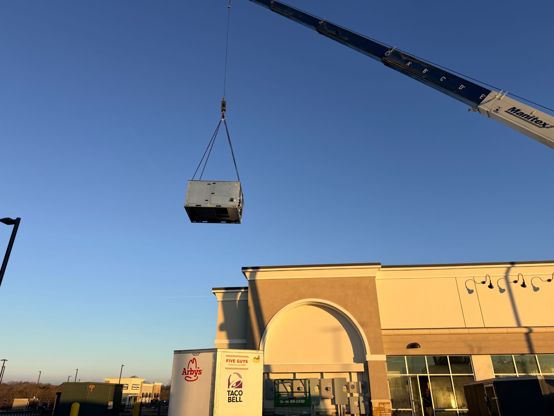 Conserve Heating & Cooling technician servicing an HVAC system in Grayson, GA
